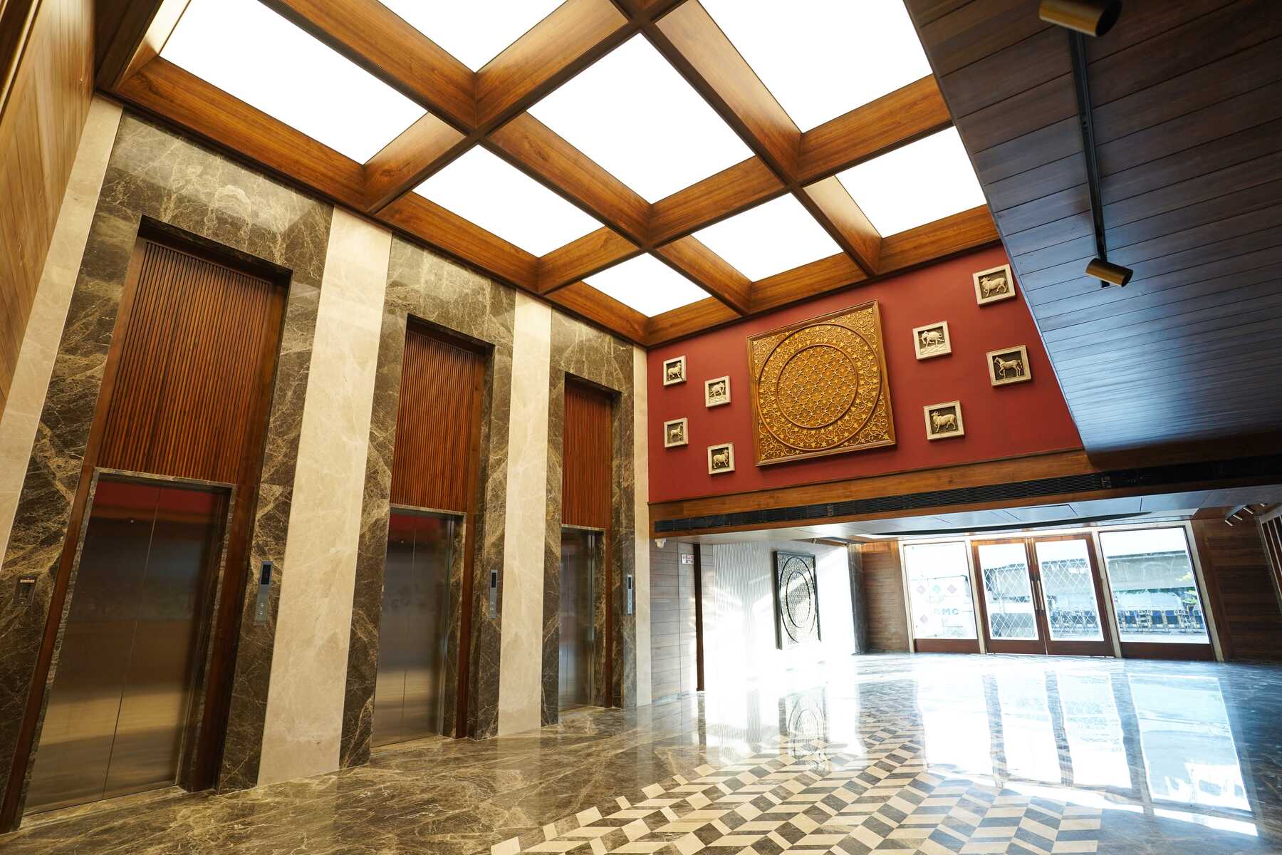A striking photo of the Space Odyssey lobby with the illuminated skylight ceiling from NEWMAT as the focal point.